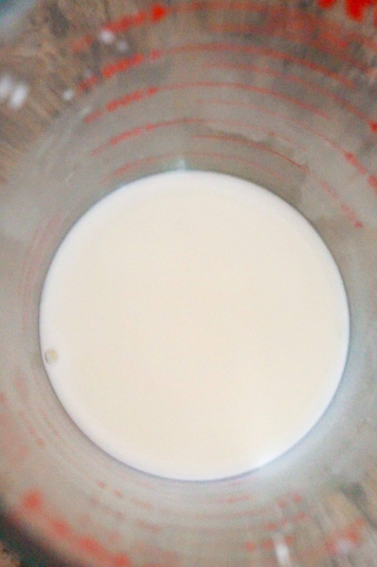 cornstarch slurry in a glass measuring cup