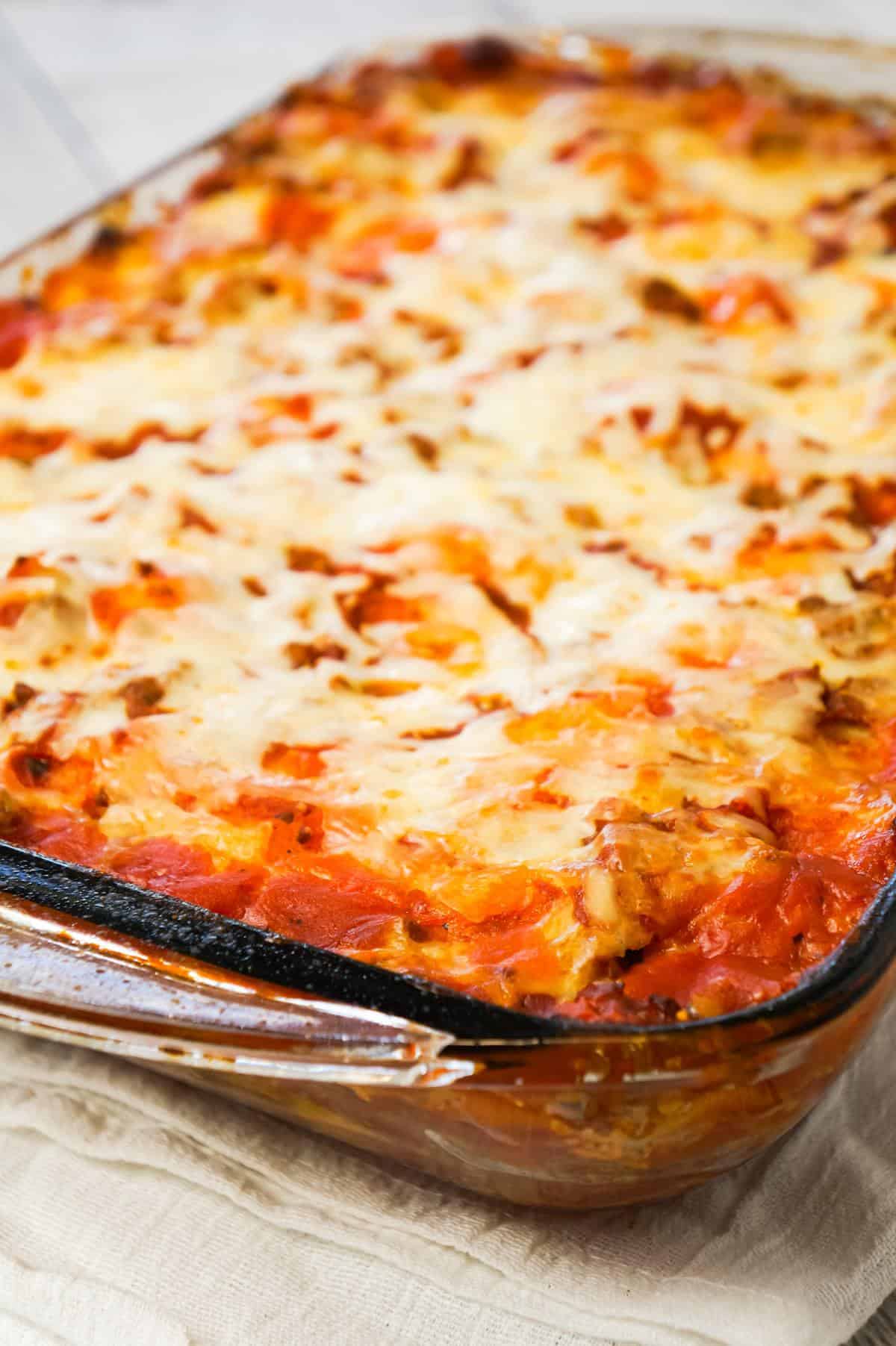 Lasagna with Ravioli is a simple and delicious twist on traditional lasagna made with frozen cheese ravioli, ground beef, marinara, ricotta and mozzarella cheese.