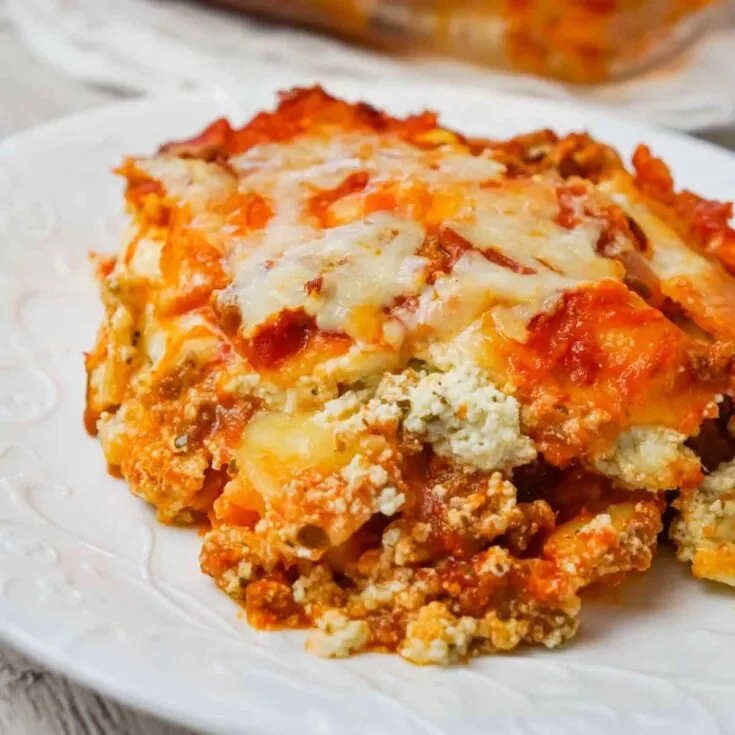 Lasagna with Ravioli is a simple and delicious twist on traditional lasagna made with frozen cheese ravioli, ground beef, marinara, ricotta and mozzarella cheese.