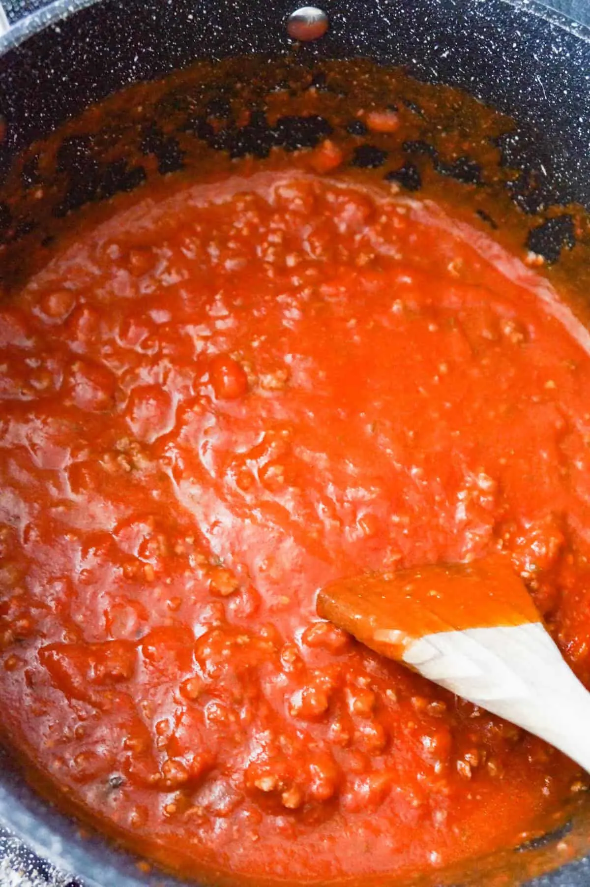 ground beef and marinara mixture in a large pot