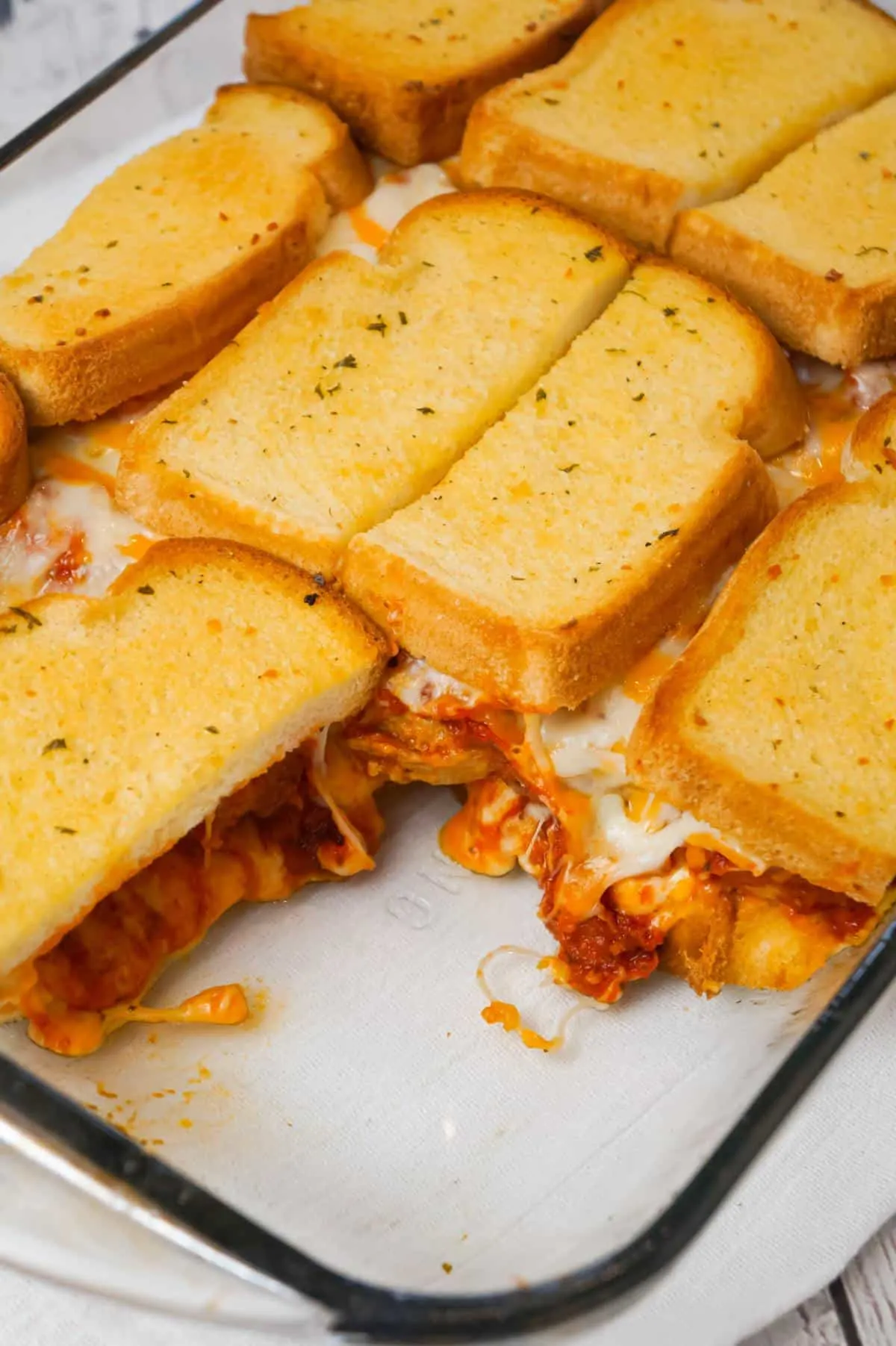 Meatball Sub Grilled Cheese Casserole is an easy casserole recipe made with Italian style meatballs, marinara sauce and loaded with cheese all sandwiched between layers of garlic toast.