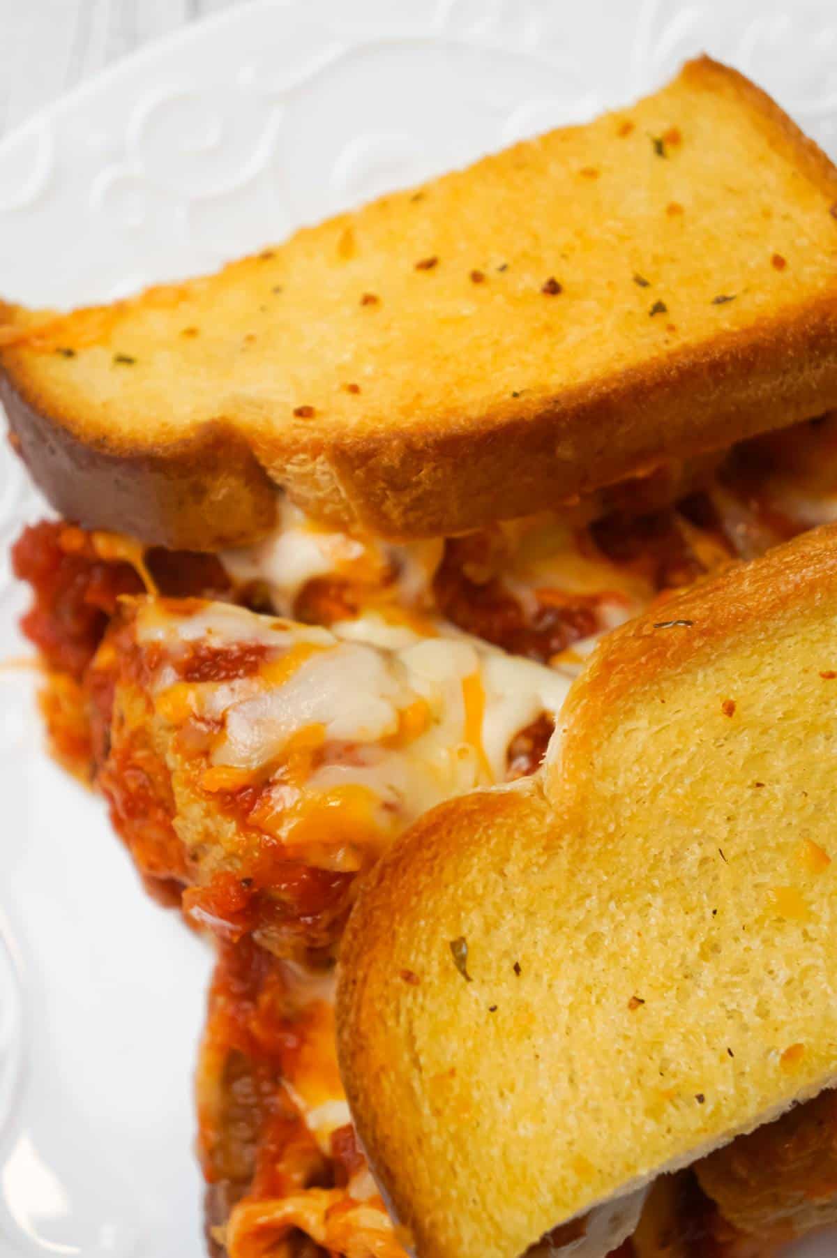 Meatball Sub Grilled Cheese Casserole is an easy casserole recipe made with Italian style meatballs, marinara sauce and loaded with cheese all sandwiched between layers of garlic toast.