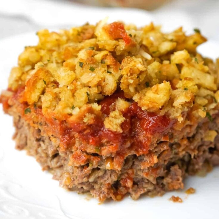Meatloaf and Stuffing Casserole is an easy ground beef dinner recipe with a meatloaf base topped with stove top stuffing.