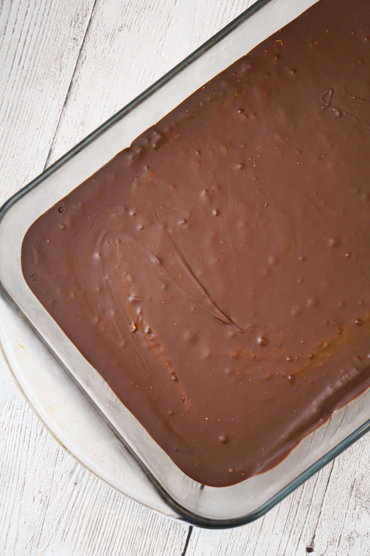 No Bake Peanut Butter Bars are tasty treats with a peanut butter and Ritz cracker crumb base and topped with chocolate.