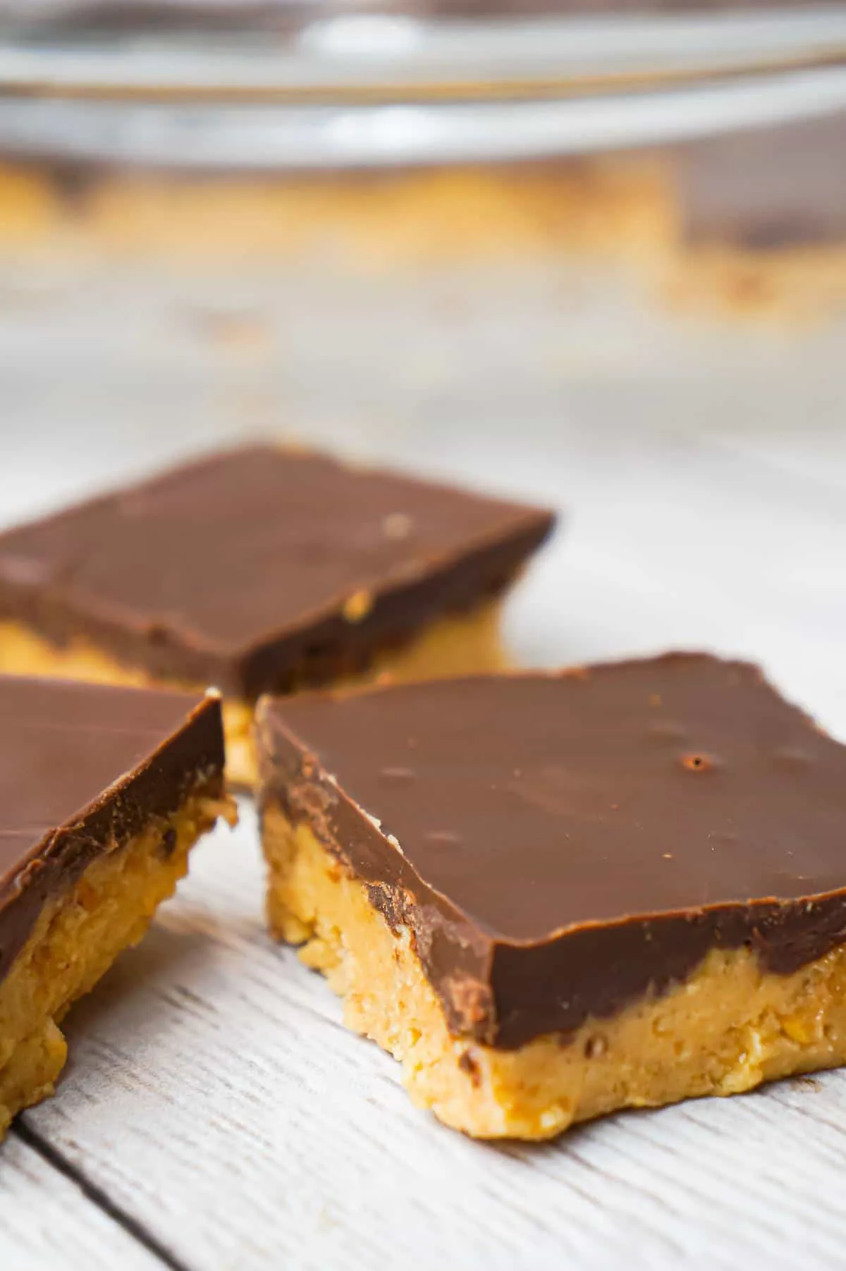 No Bake Peanut Butter Bars are tasty treats with a peanut butter and Ritz cracker crumb base and topped with chocolate.