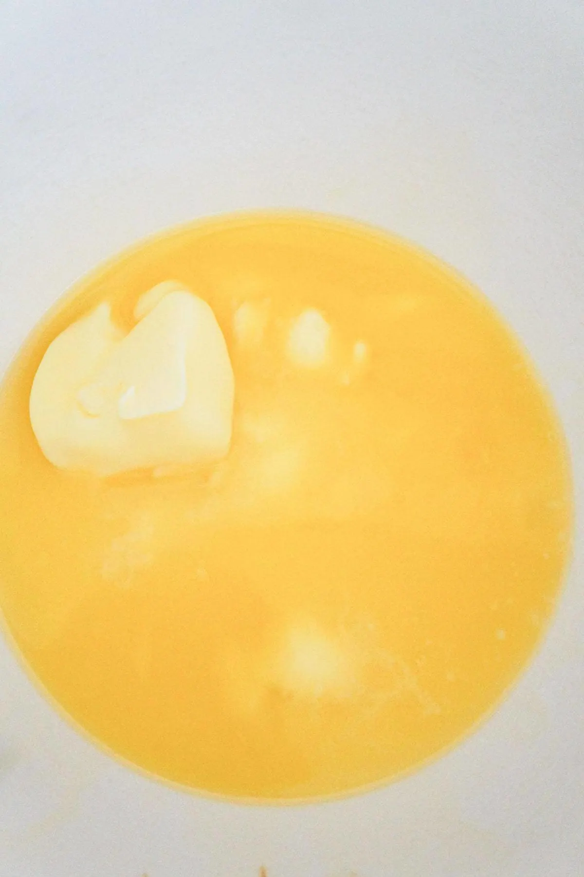 melted butter in a mixing bowl
