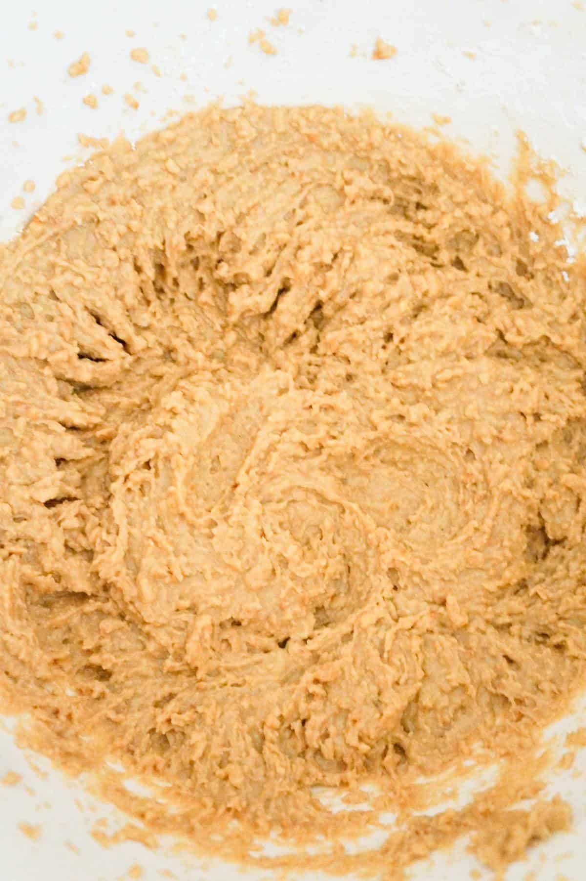 creamy peanut butter mixture in a mixing bowl
