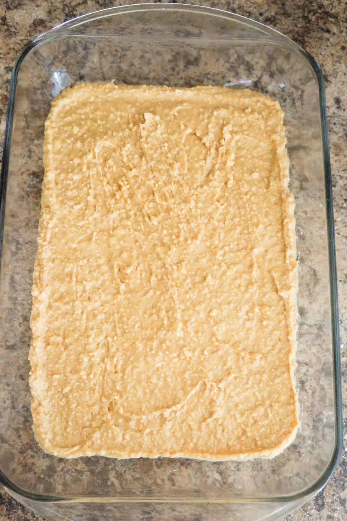 peanut butter and Ritz cracker mixture in a baking dish