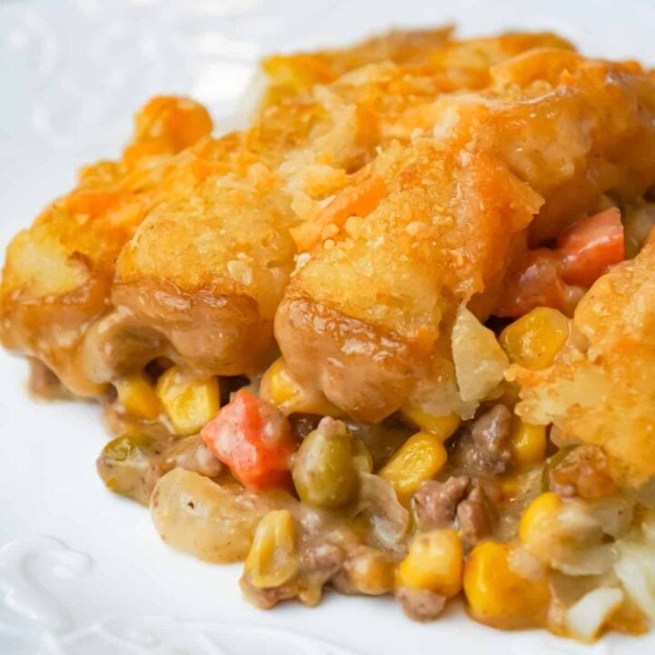 Tater Tot Hotdish is an easy ground beef casserole recipe loaded with canned veggies, cream of mushroom soup, cheddar cheese and topped with tater tots.