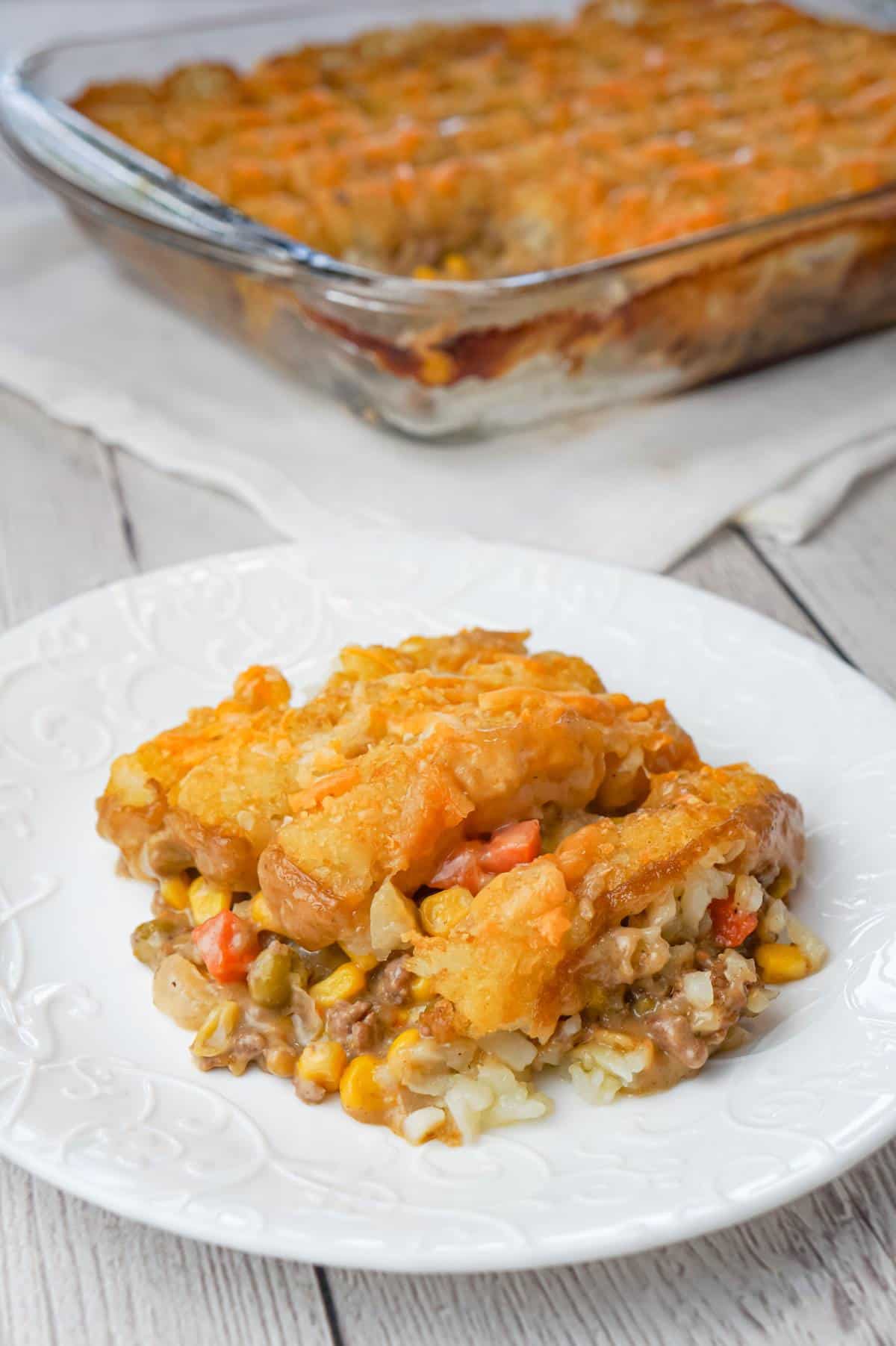 Tater Tot Hotdish is an easy ground beef casserole recipe loaded with canned veggies, cream of mushroom soup, cheddar cheese and topped with tater tots.