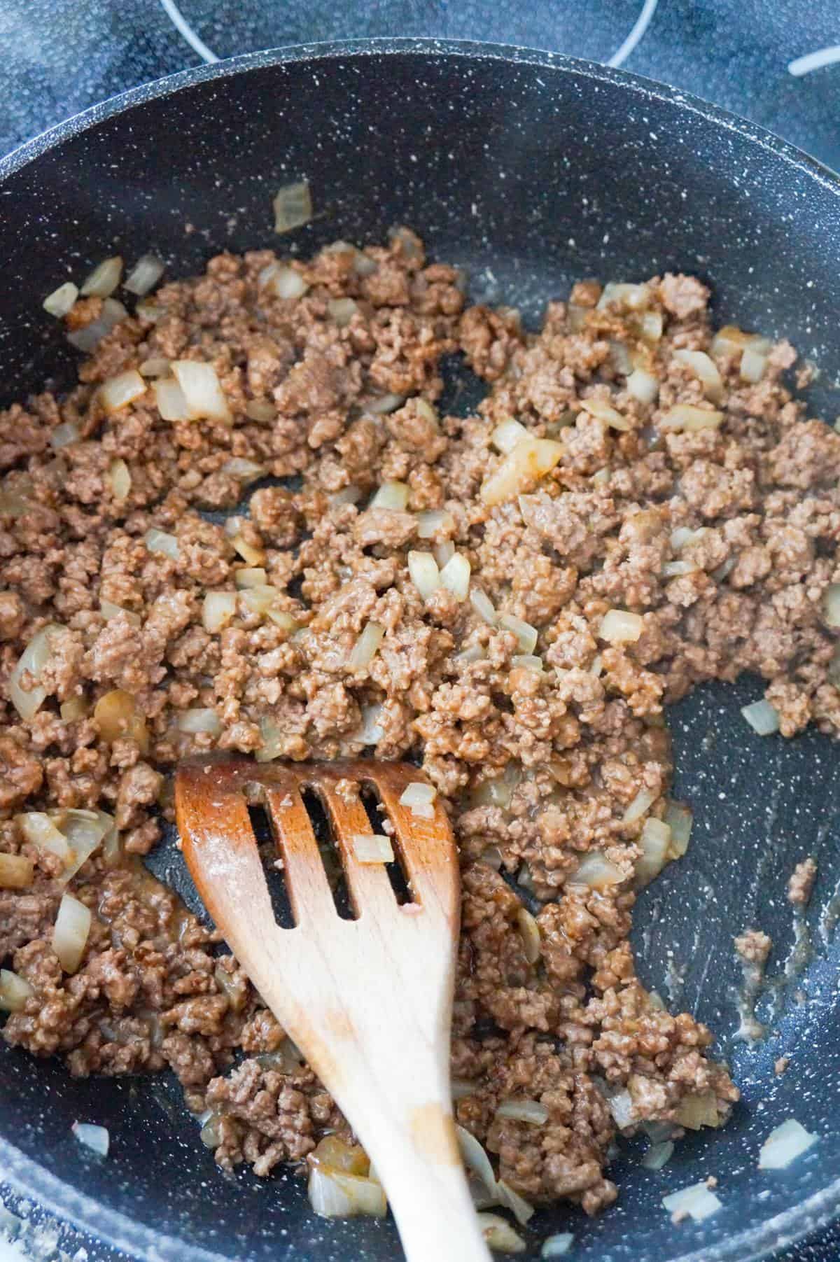 ground beef in gravy mix in a saute pan