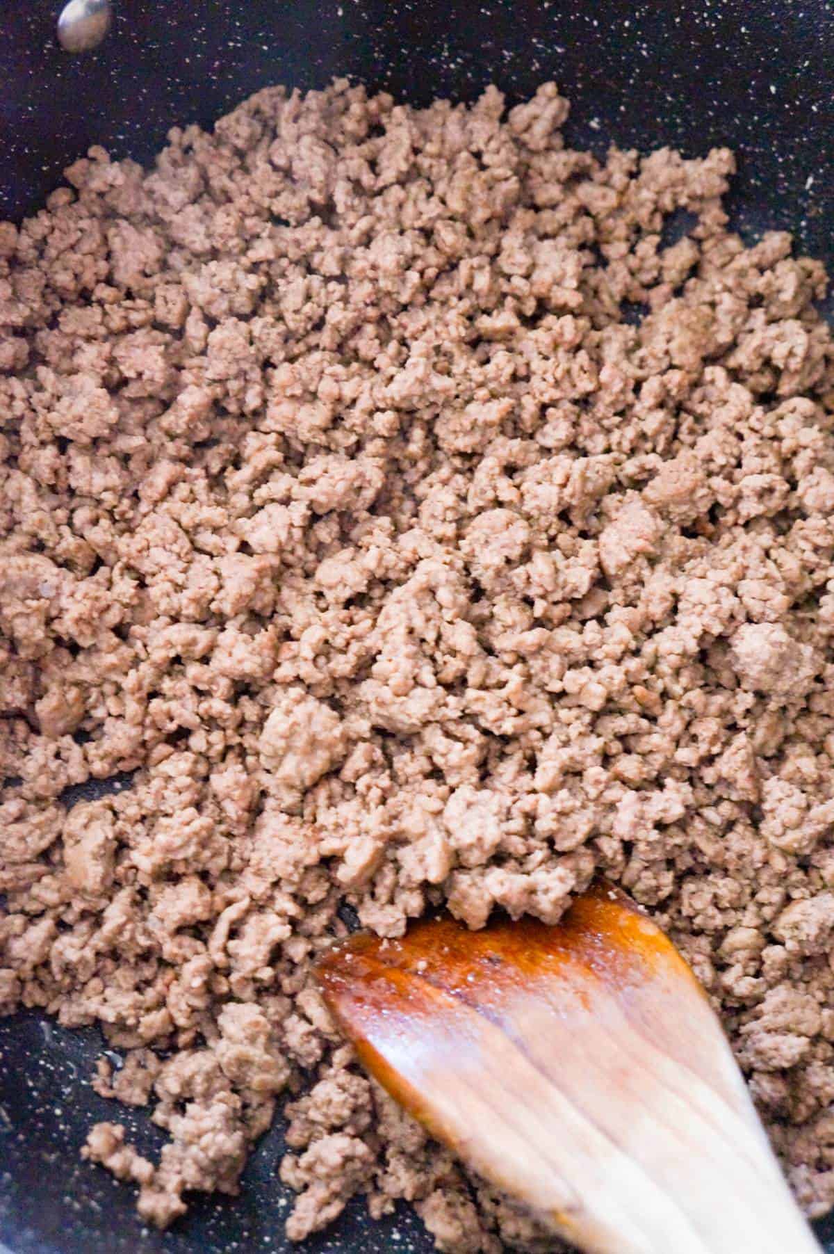 cooked ground beef in a saute pan