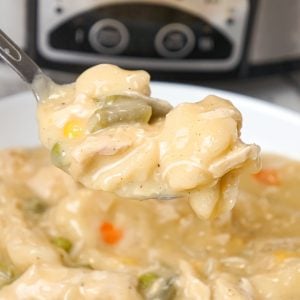 Crock Pot Chicken and Dumplings is an easy slow cooker dinner recipe loaded with chicken breast, veggies and Pillsbury biscuit dough dumplings all in a creamy sauce.