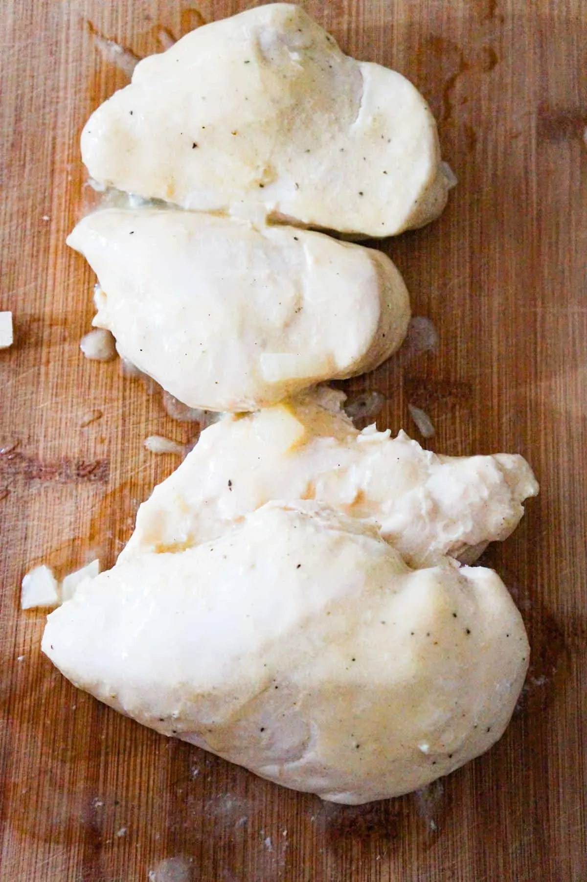 cooked chicken on a cutting board