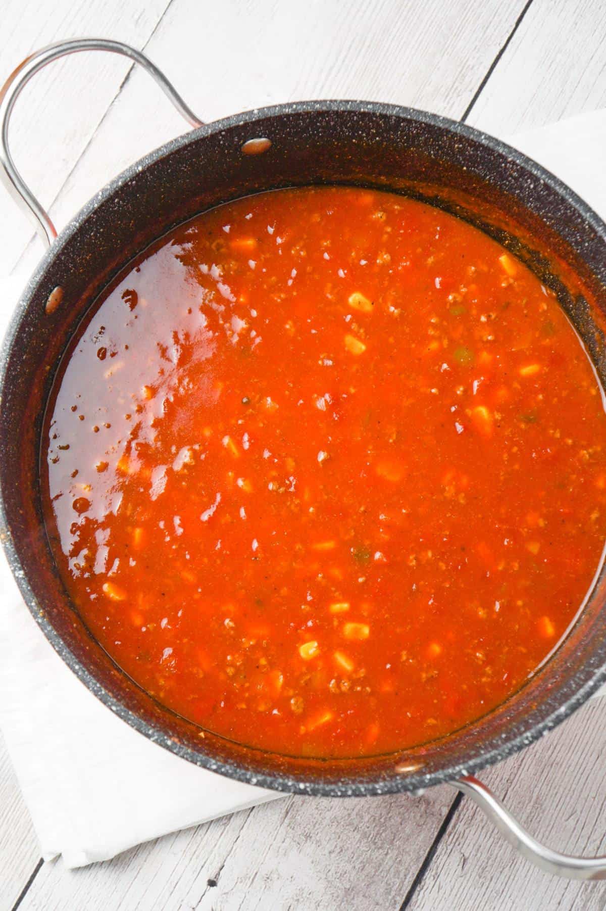 Easy Taco Soup is a hearty soup recipe loaded with ground beef, taco seasoning, salsa, Rotel, mixed beans and corn.