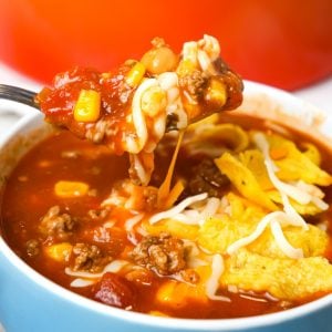 Easy Taco Soup is a hearty soup recipe loaded with ground beef, taco seasoning, salsa, Rotel, mixed beans and corn.