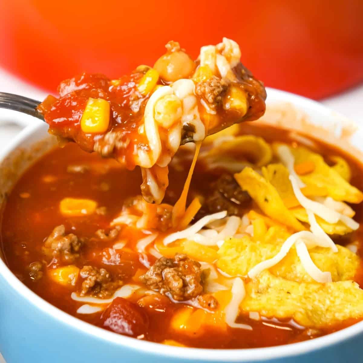 Easy Taco Soup is a hearty soup recipe loaded with ground beef, taco seasoning, salsa, Rotel, mixed beans and corn.