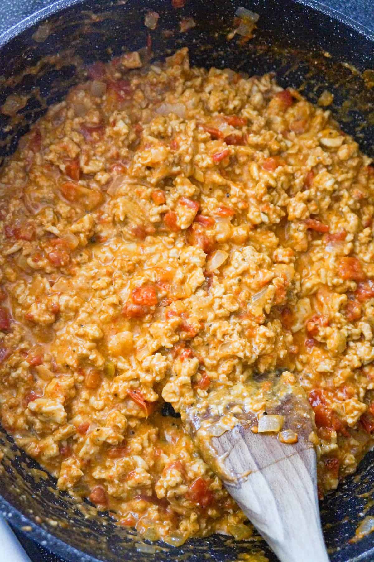 ground chicken taco meat mixture in a saute pan