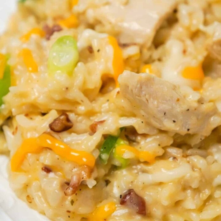 Instant Pot Cheddar Bacon Ranch Chicken and Rice is an easy pressure cooker dinner recipe loaded with chicken breast chunks, crumbled bacon and shredded cheddar cheese.