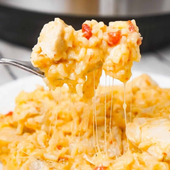 Instant Pot Cheesy Chicken and Rice is an easy pressure cooker dinner recipe made with long grain white rice and loaded with chunks of boneless, skinless chicken breasts and shredded cheese.