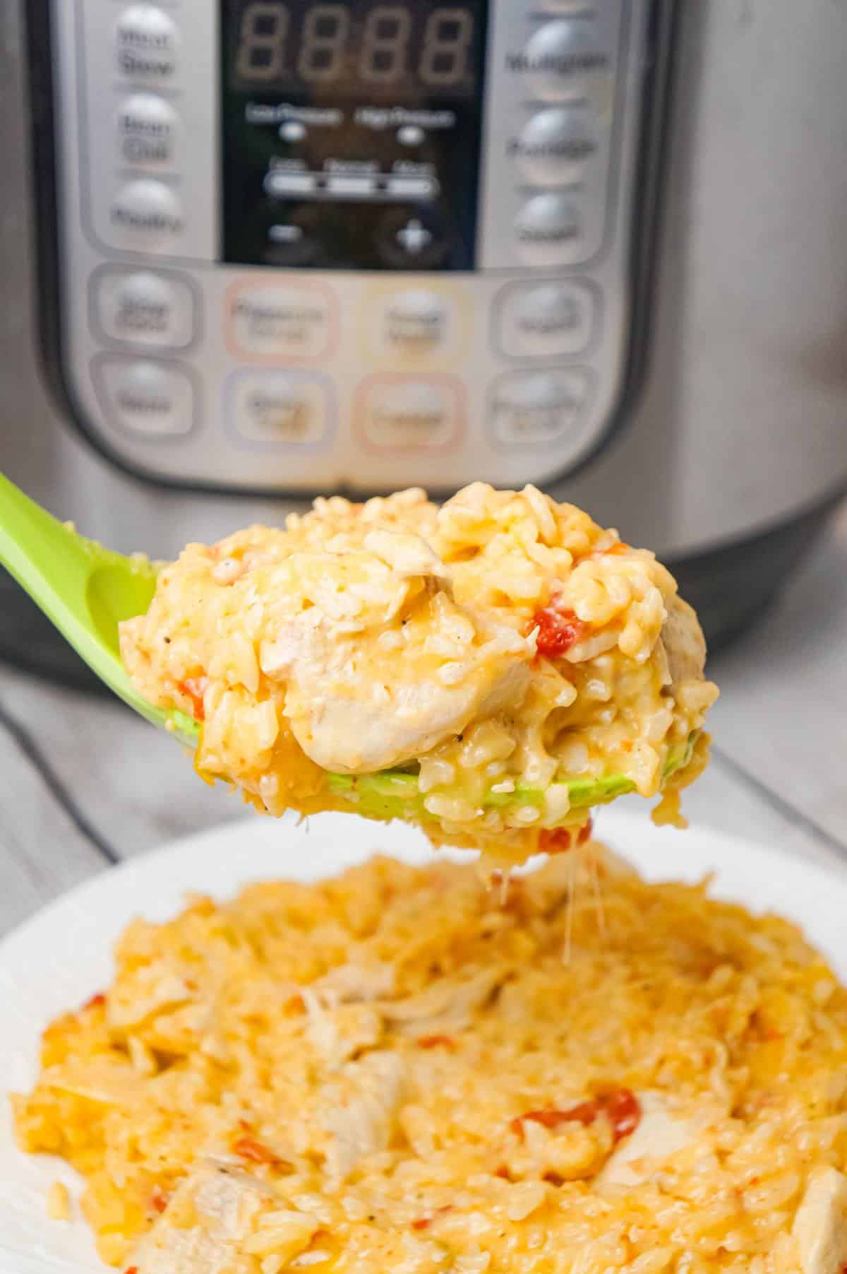 Instant Pot Cheesy Chicken and Rice is an easy pressure cooker dinner recipe made with long grain white rice and loaded with chunks of boneless, skinless chicken breasts and shredded cheese.