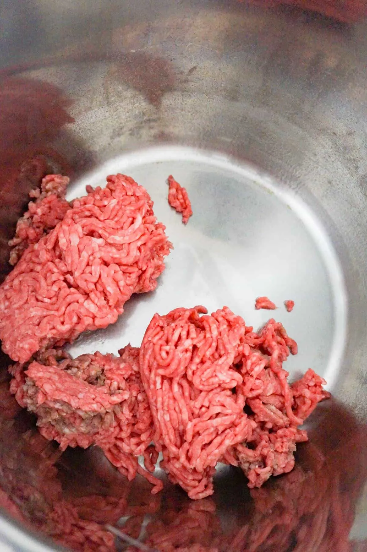 raw ground beef in an Instant Pot