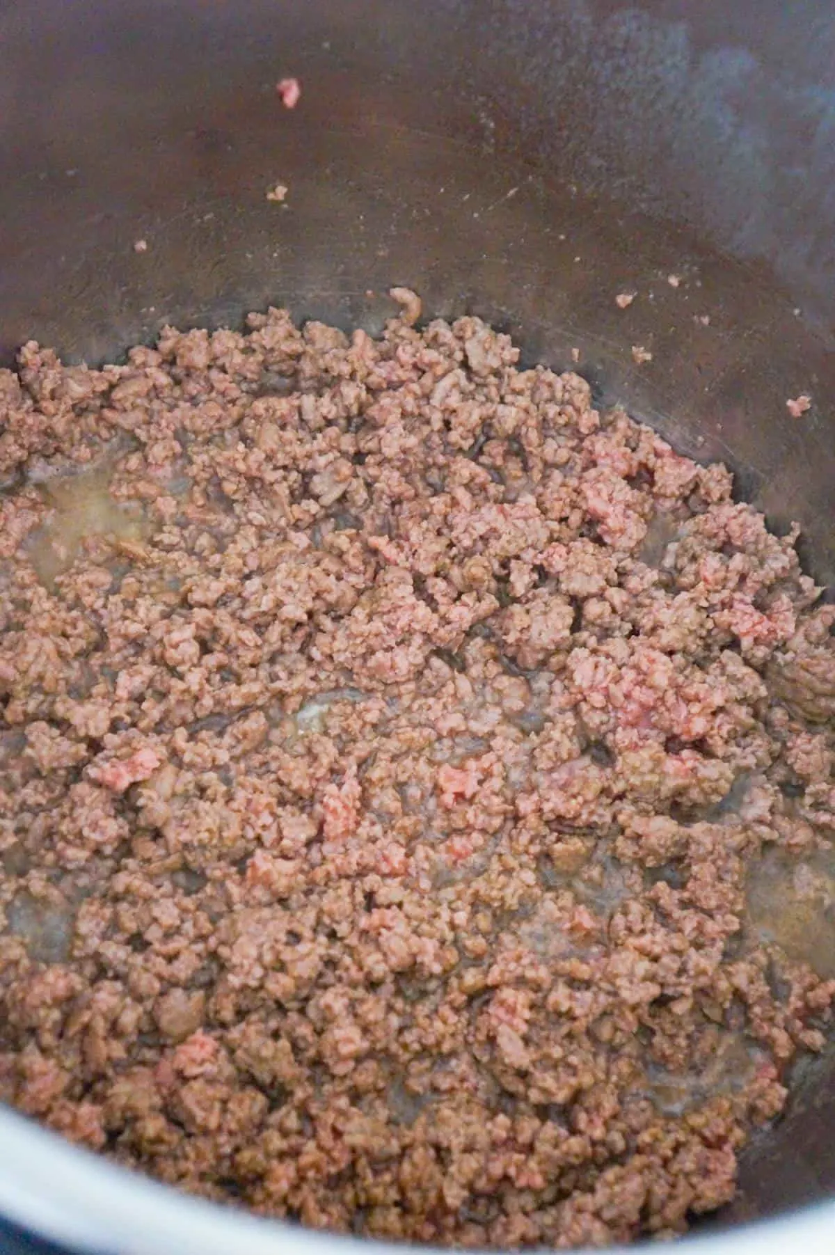 slightly pink ground beef in an Instant Pot
