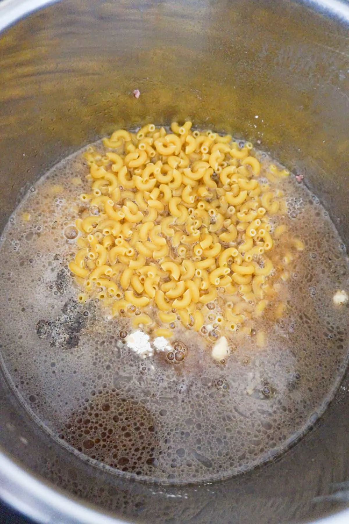 macaroni and beef broth in an Instant Pot