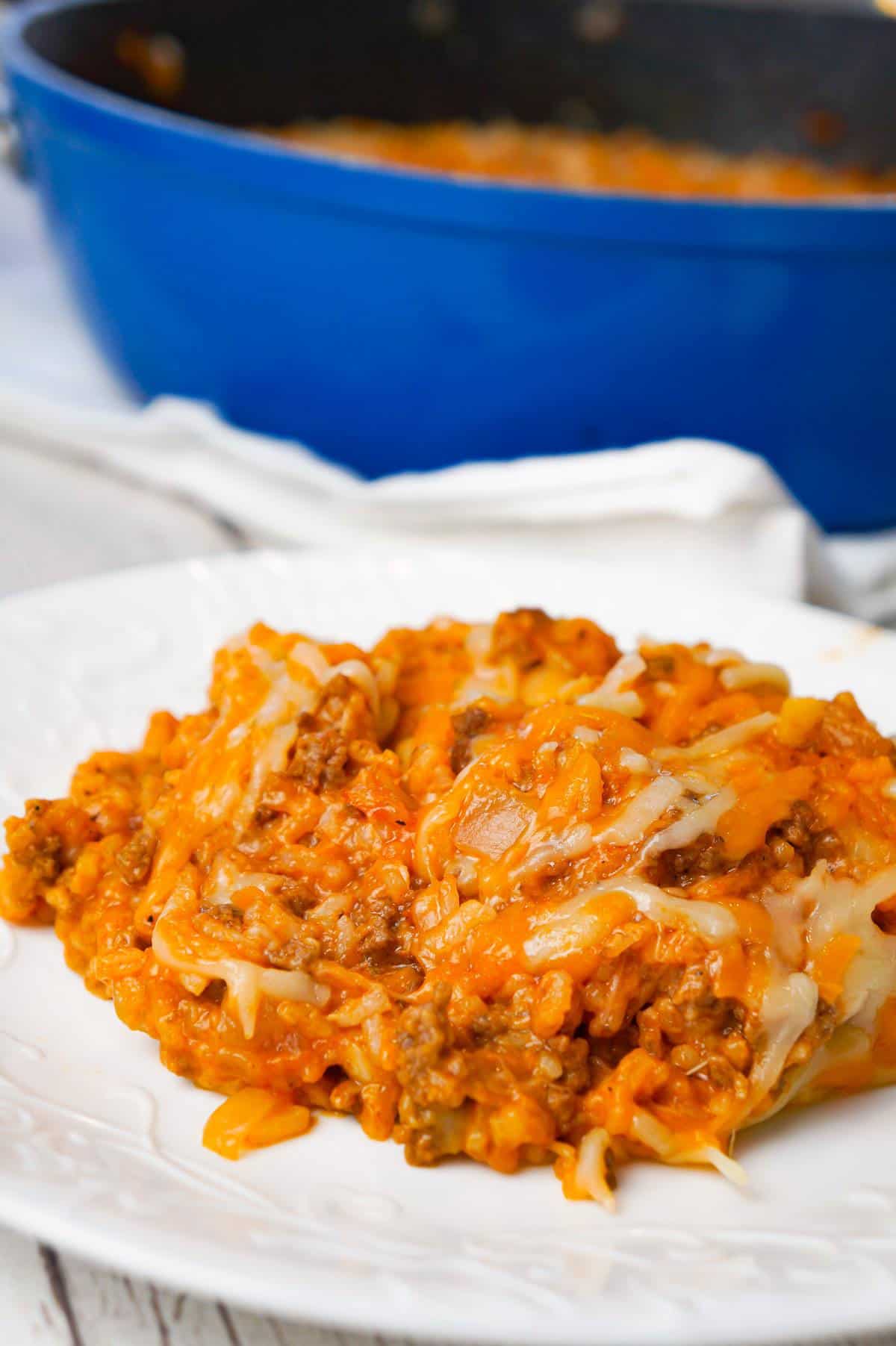 One Pot Sloppy Joe Ground Beef and Rice is an easy stove top dinner recipe made with ground beef and minute rice all tossed in sloppy joe sauce and loaded with shredded mozzarella and cheddar cheese.