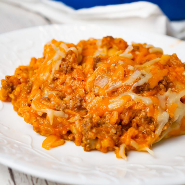 One Pot Sloppy Joe Ground Beef and Rice is an easy stove top dinner recipe made with ground beef and minute rice all tossed in sloppy joe sauce and loaded with shredded mozzarella and cheddar cheese.