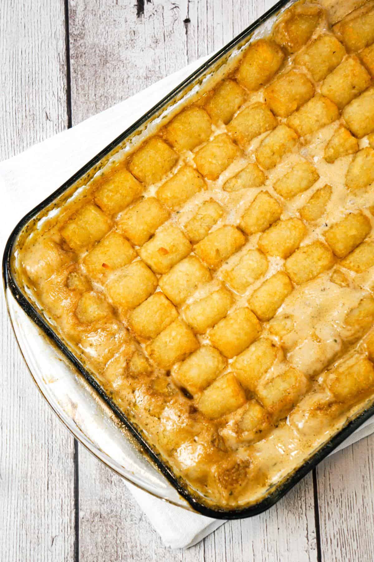 Swedish Meatball Tater Tot Casserole is an easy casserole recipe made with frozen Swedish meatballs smothered in a creamy gravy and topped with mozzarella cheese and tater tots.