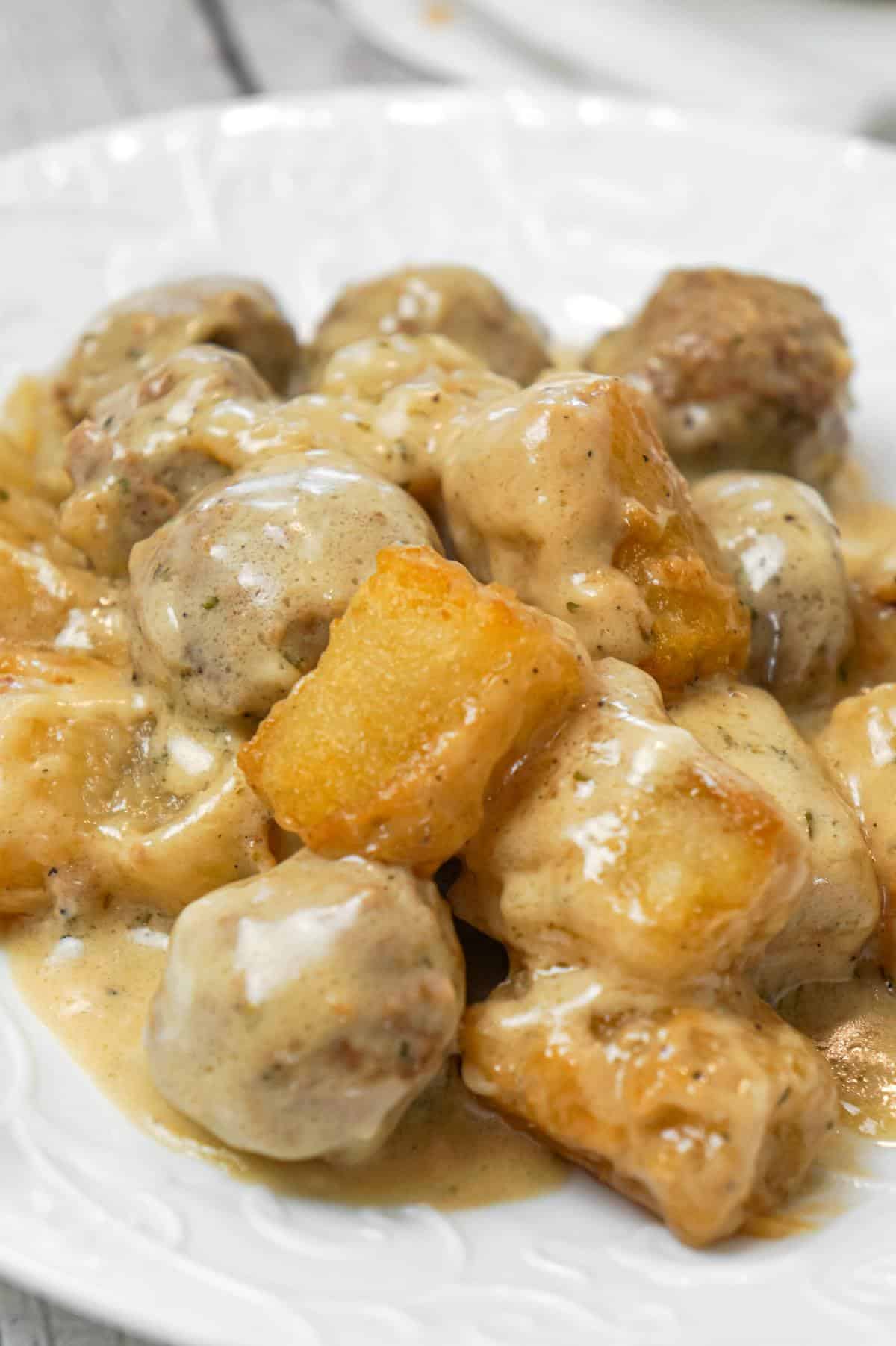 Swedish Meatball Tater Tot Casserole is an easy casserole recipe made with frozen Swedish meatballs smothered in a creamy gravy and topped with mozzarella cheese and tater tots.