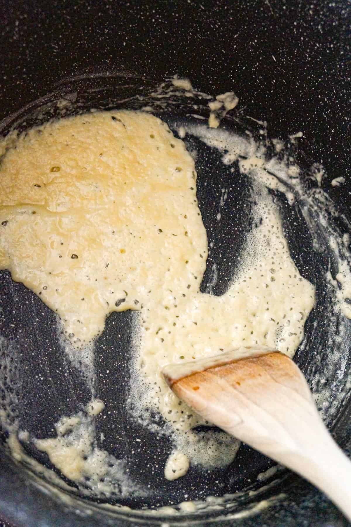 flour and butter mixture cooking in a large pot