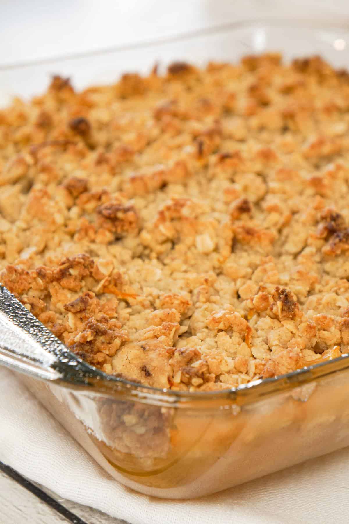 Apple Crumble is a delicious fruit dessert with a base of apple pie filling with a crunchy crumble topping with hints of citrus and cinnamon.