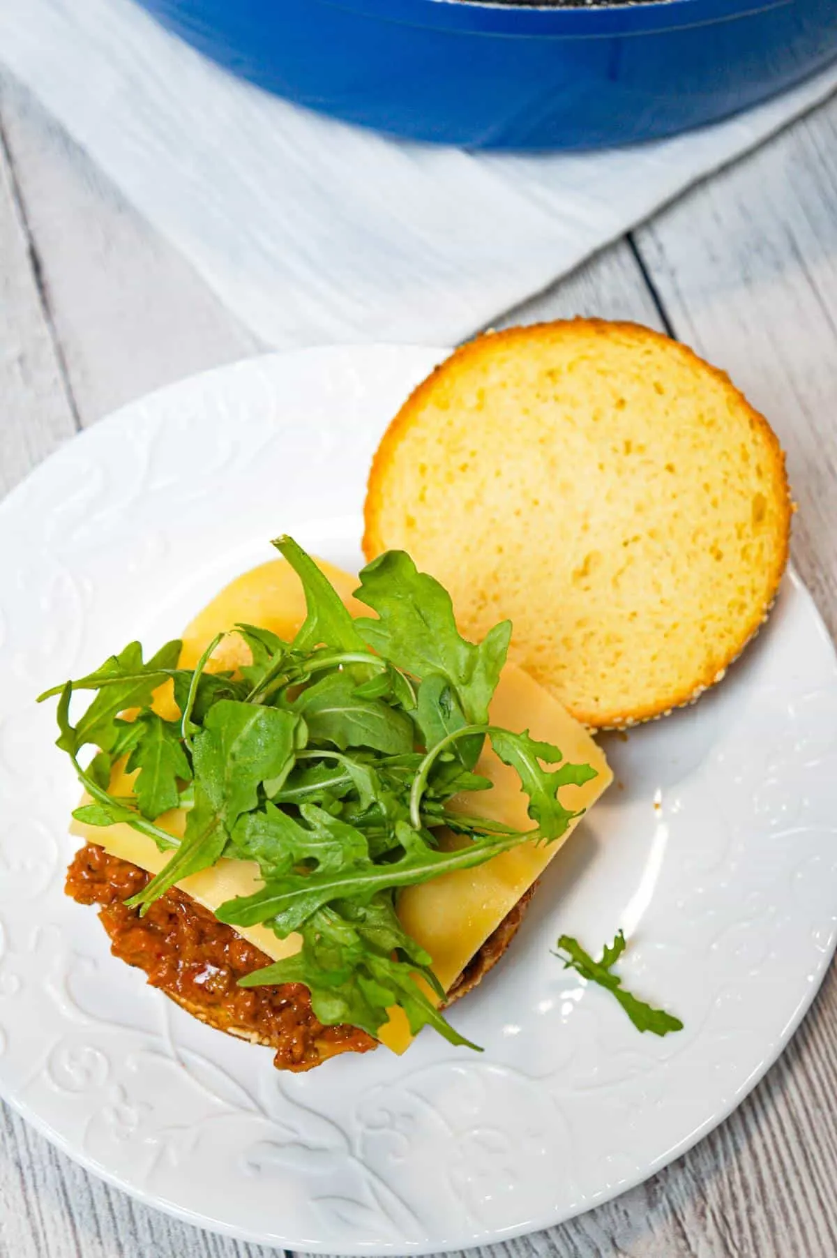 Butter Chicken Sloppy Joes are an easy ground chicken dinner recipe with a delicious tomato curry sauce served on Brioche buns with Havarti cheese and arugula.