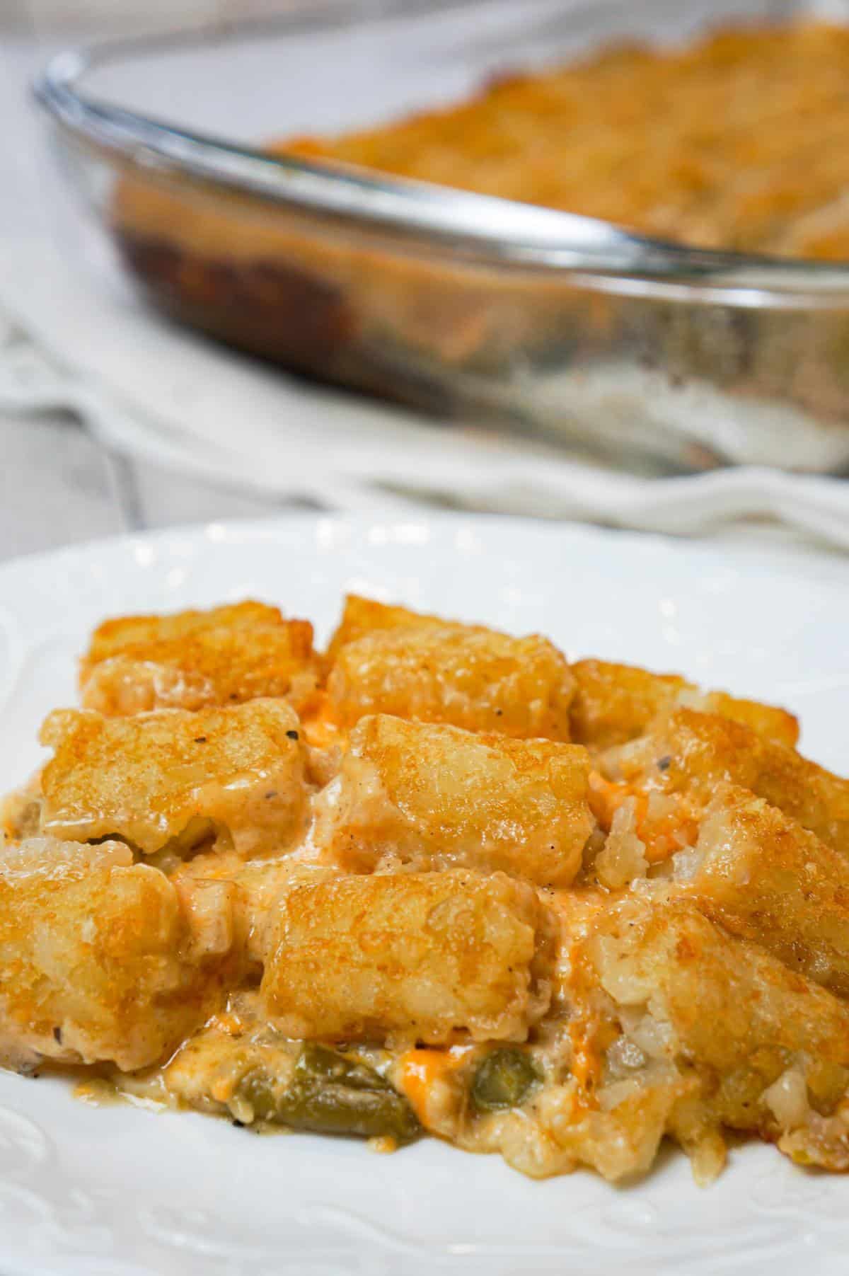 Green Bean Casserole with Tater Tots is an easy side dish recipe made with canned green beans and loaded with cream of mushroom soup, French's fried onions, shredded cheese and tater tots.