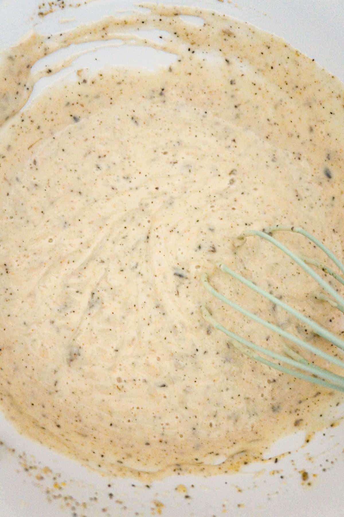 cream of mushroom soup mixture in a mixing bowl