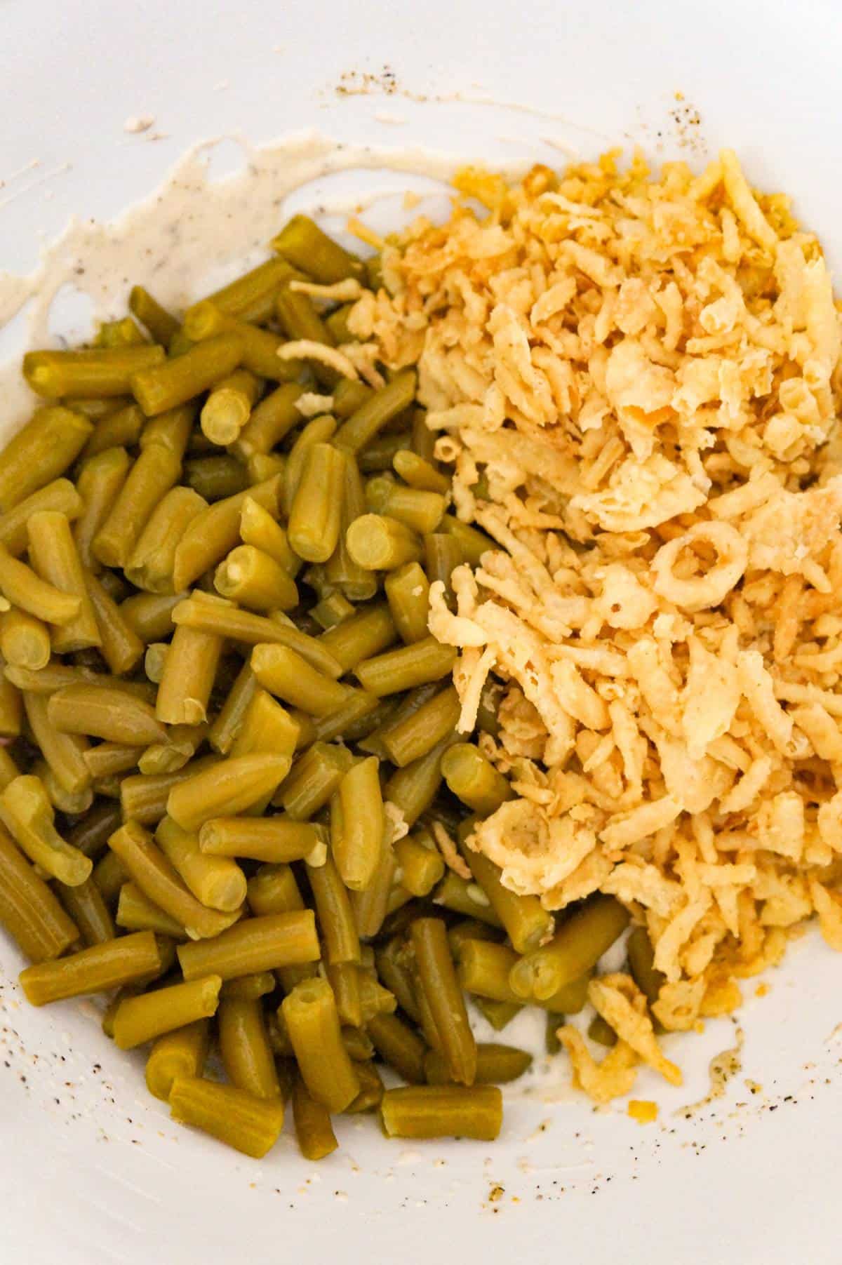 green beans and French's fried onions in a mixing bowl