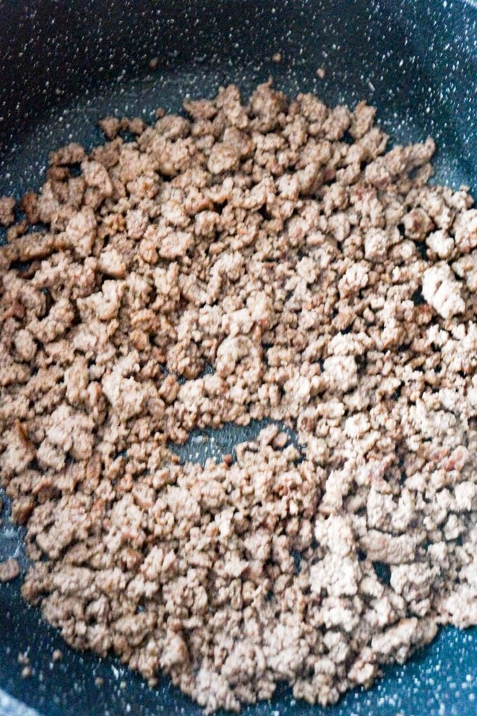 cooked ground beef in a pan