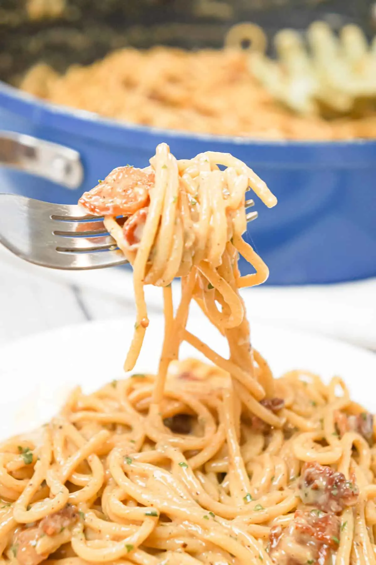 Spaghetti Carbonara is an easy pasta dish loaded with crispy bacon and tossed in an egg and Parmesan sauce.