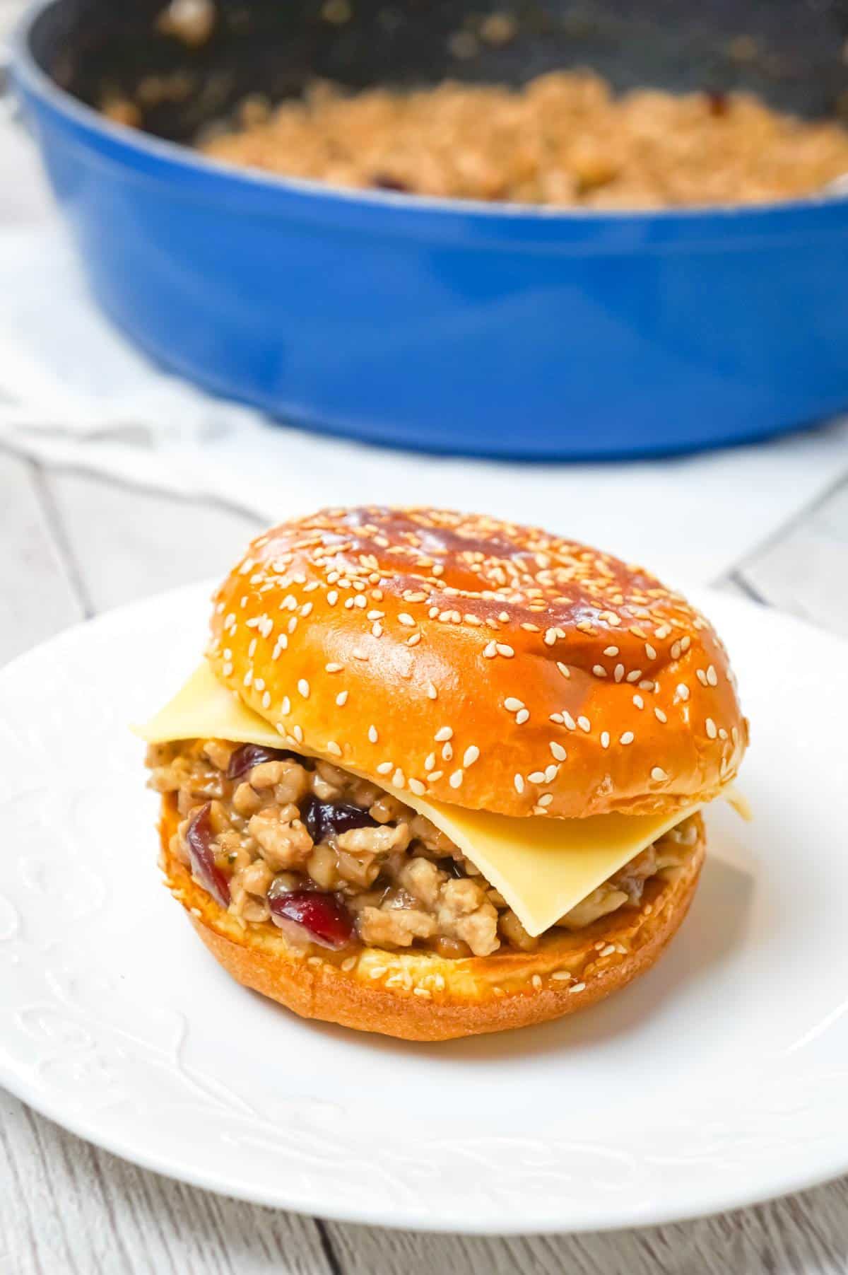 Turkey Dinner Sloppy Joes are an easy weeknight dinner recipe made with ground turkey and loaded with gravy, stove top stuffing mix, cranberry sauce and Havarti cheese all on served on Brioche buns.