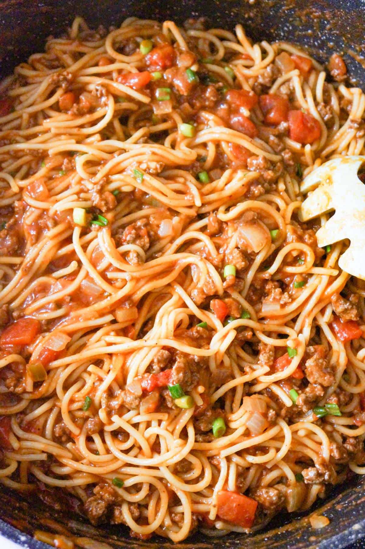 taco spaghetti with green onions and Rotel