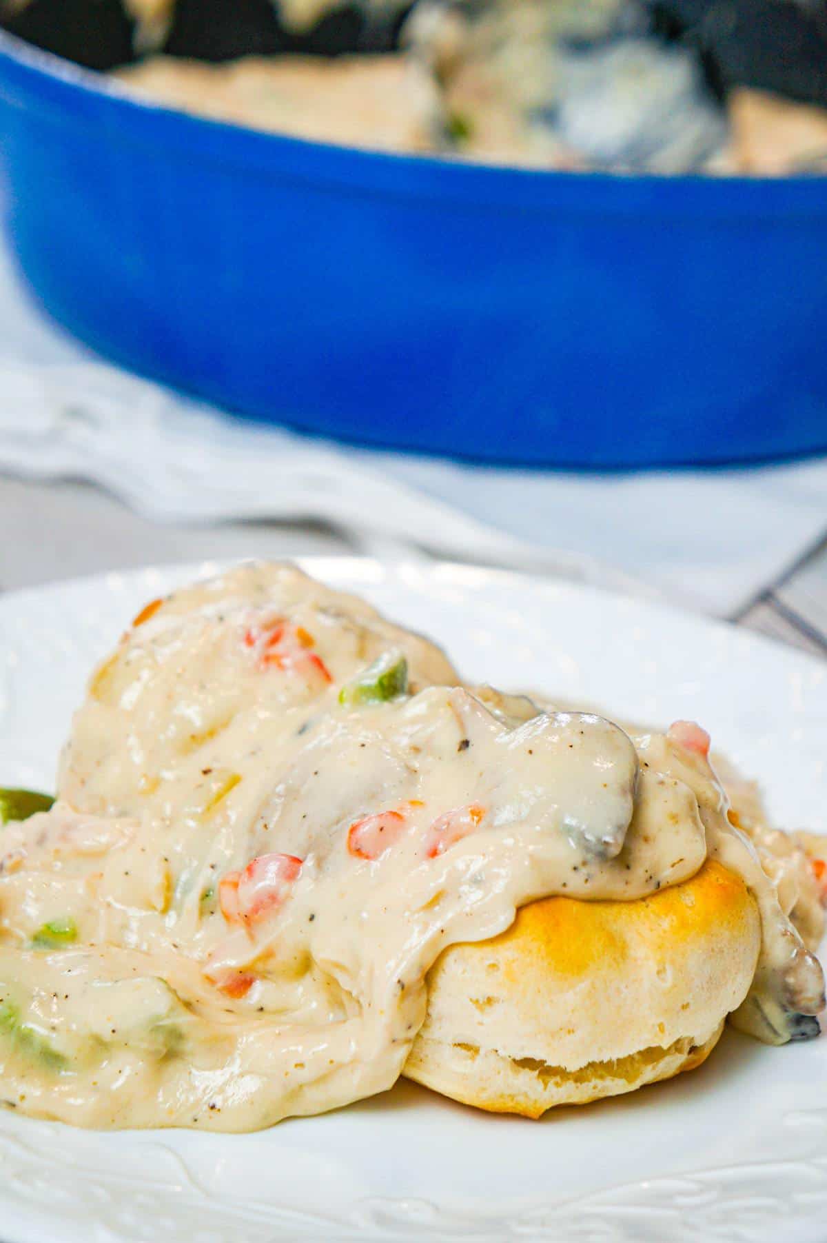 Chicken a la King is an easy stove top chicken dinner recipe made with shredded chicken in a thick and creamy sauce loaded with onions, mushrooms, green peppers and pimentos, served over biscuits, rice or pasta.