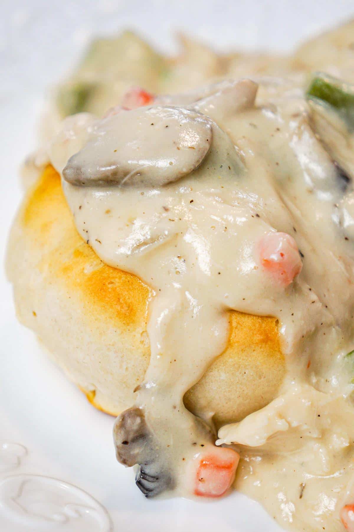 Chicken a la King is an easy stove top chicken dinner recipe made with shredded chicken in a thick and creamy sauce loaded with onions, mushrooms, green peppers and pimentos, served over biscuits, rice or pasta.