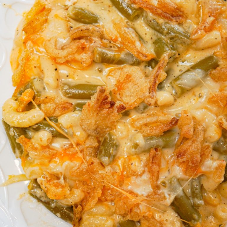 Mac and Cheese Green Bean Casserole is a tasty side dish recipe loaded with macaroni and green beans in a creamy cheese sauce, all topped with French's crispy fried onions!