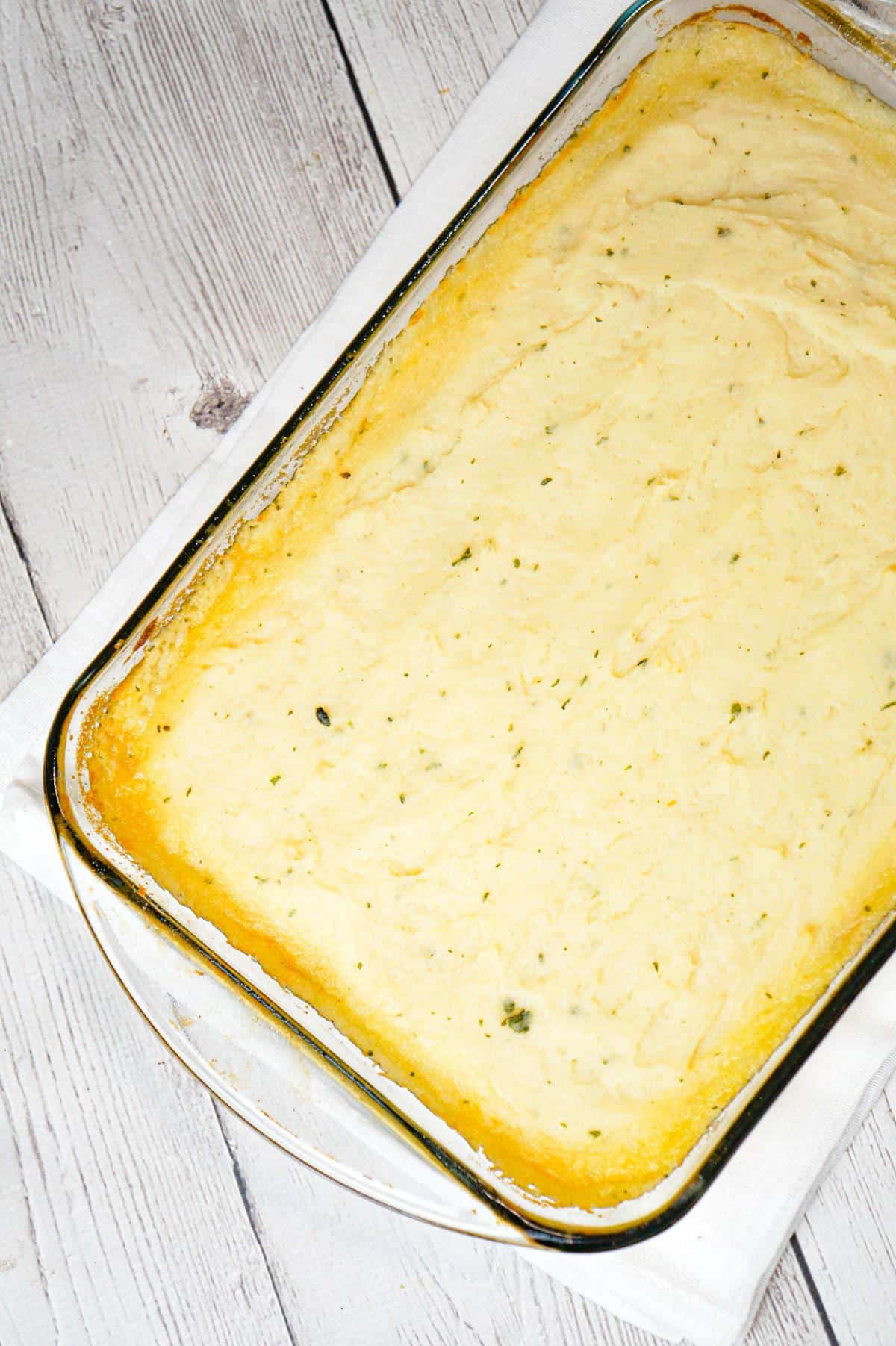 Philly Cheese Steak Shepherd's Pie is an easy casserole recipe loaded with ground beef, onions, green peppers, cheese and mashed potatoes.