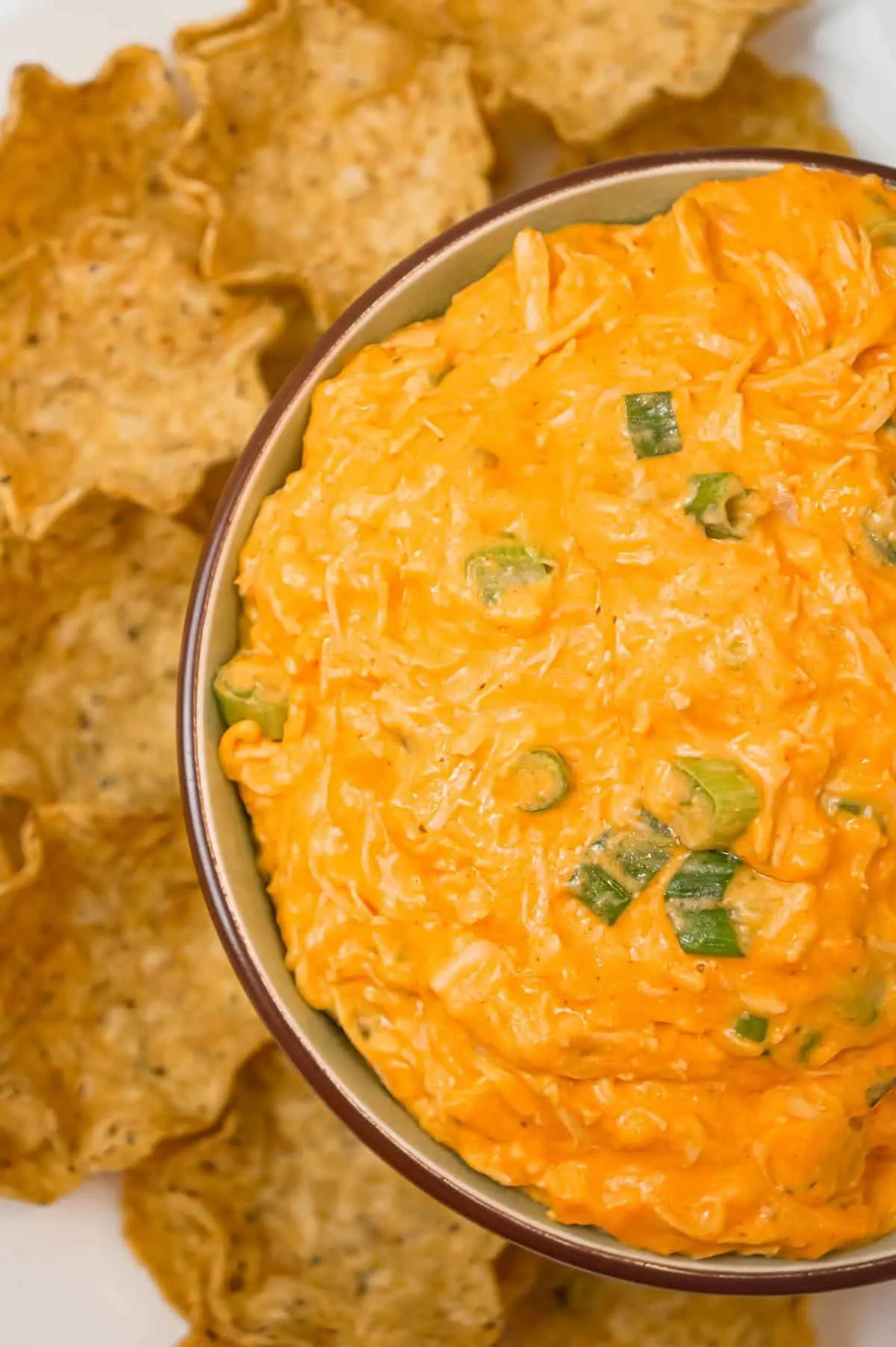 Crock Pot Buffalo Chicken Dip is a delicious hot party dip recipe loaded with shredded chicken, cream cheese, ranch dressing, shredded cheese and Buffalo sauce.
