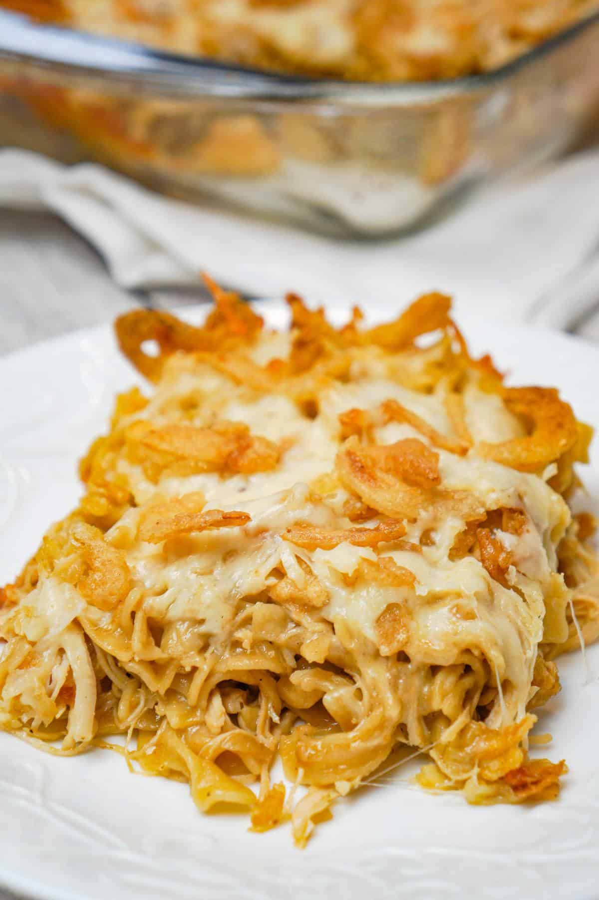 French Onion Chicken Casserole is a hearty casserole recipe loaded with shredded chicken, egg noodles, onion soup mix, cream of chicken soup, mozzarella cheese, parmesan cheese and French's crispy fried onions.