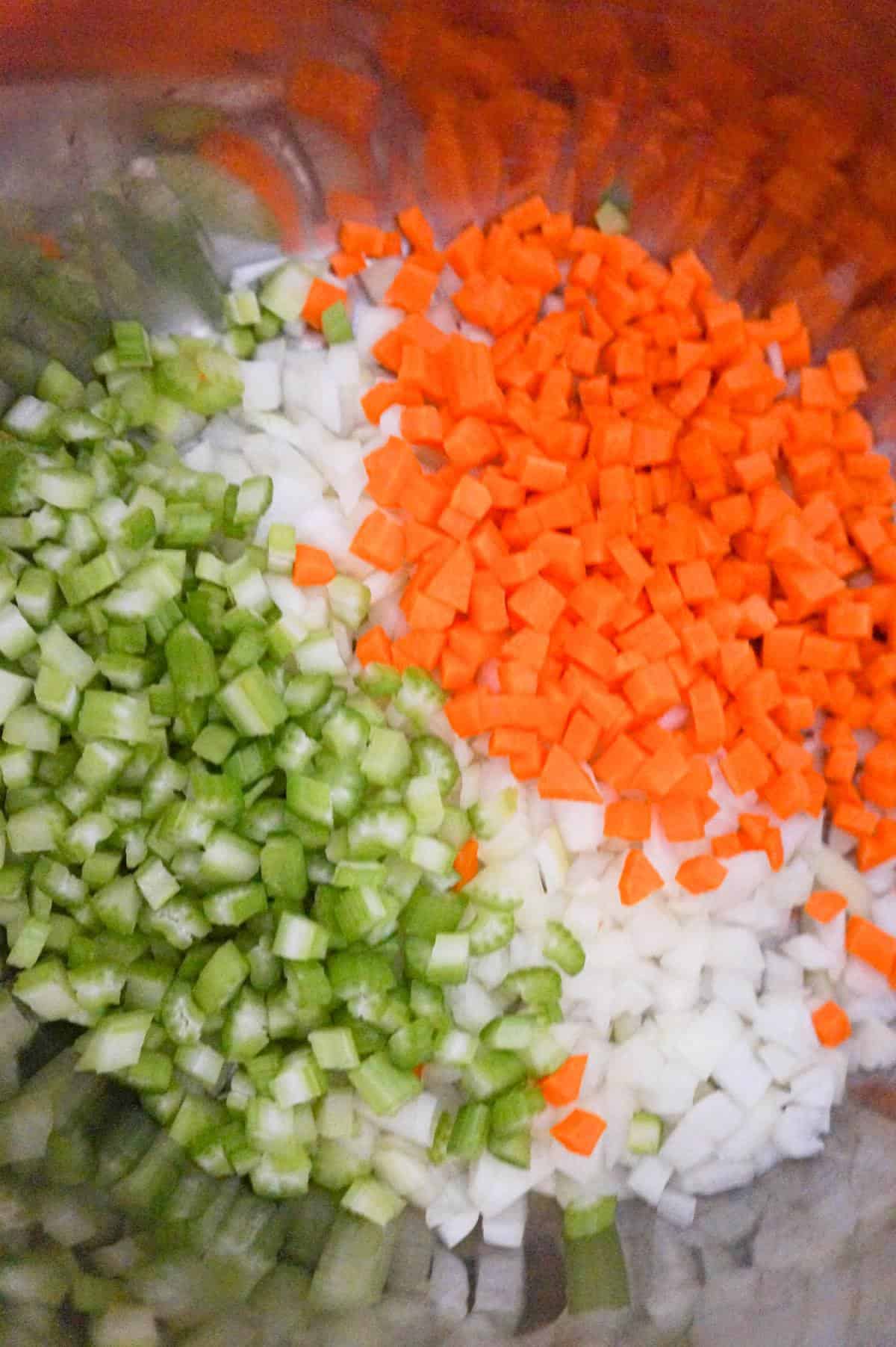diced carrot, onion and celery in an Instant Pot