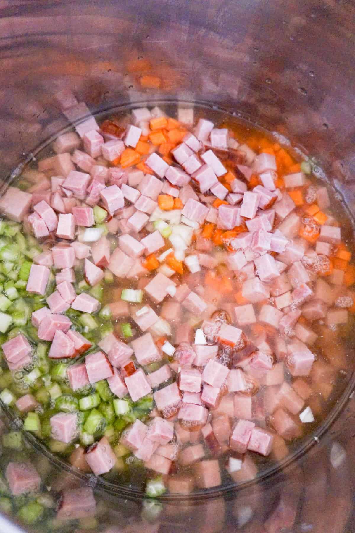 diced ham and diced vegetables in broth in an Instant Pot